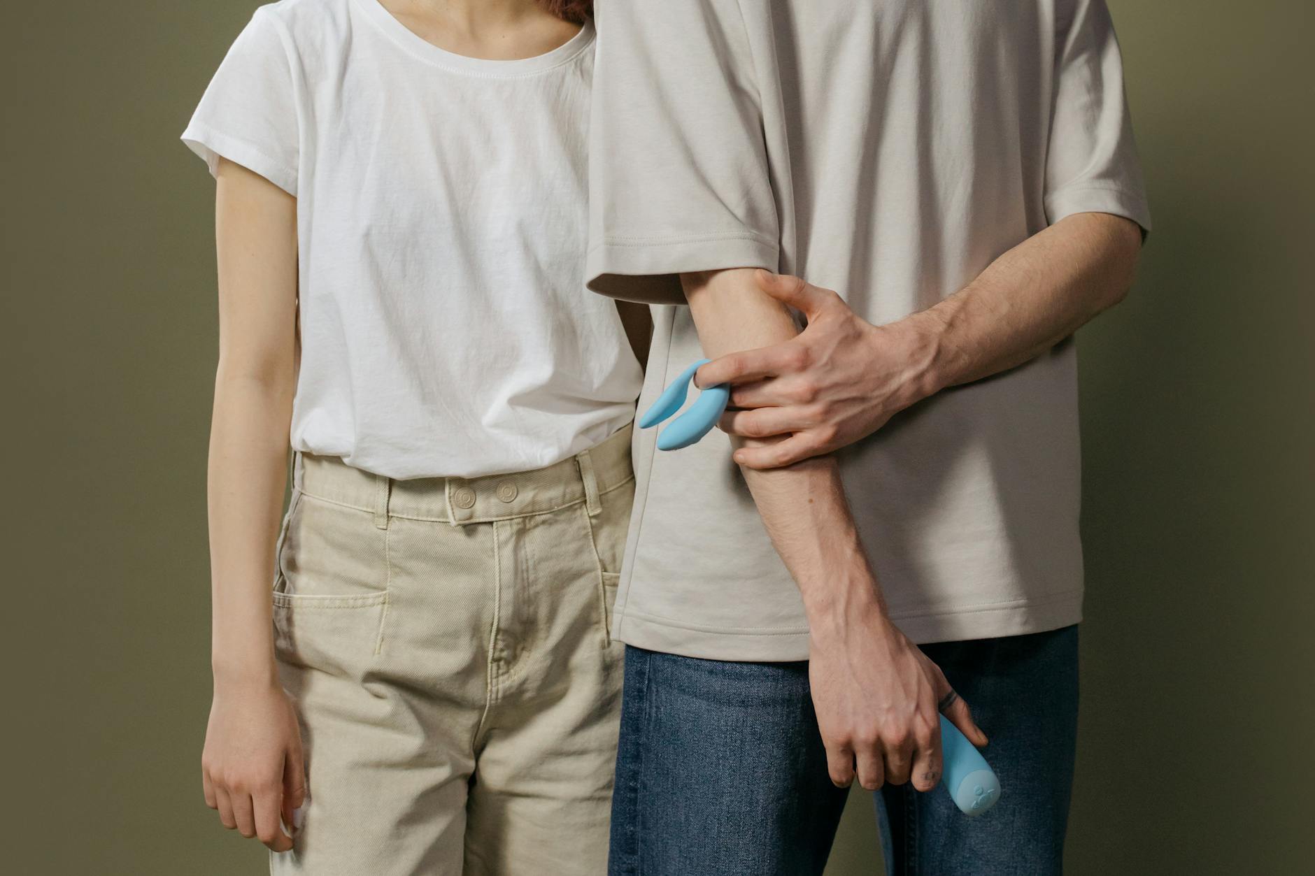 A close-up of a couple embracing, showing physical intimacy and connection.